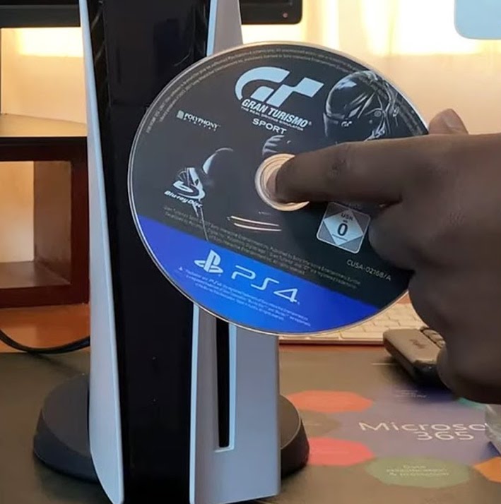 how to insert PS5 disc