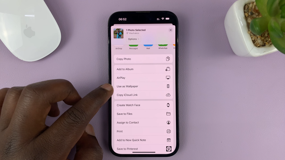 How To Use a Photo In Your iPhone Photo Library as Wallpaper