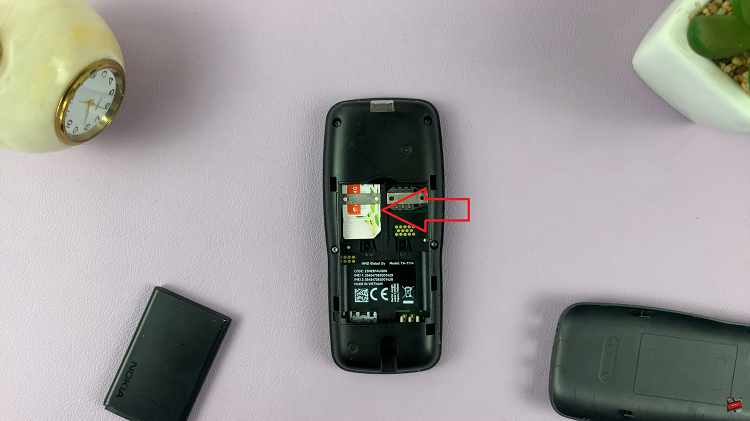 Insert SIM In Nokia Phone.