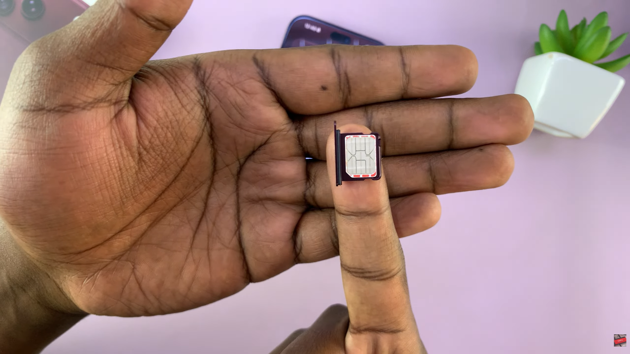 Insert SIM Card In iPhone 18